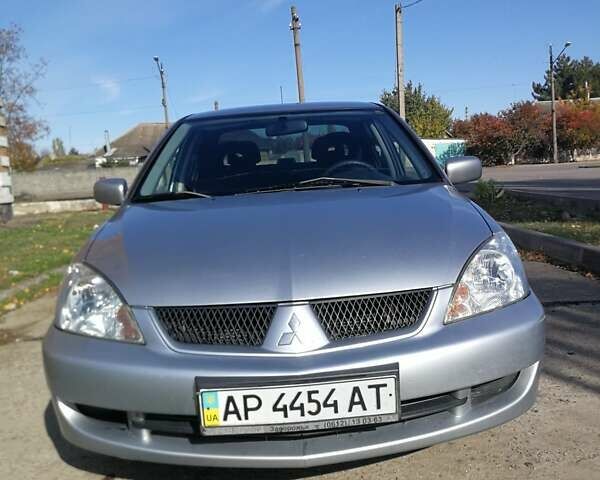 Сірий Міцубісі Lancer, об'ємом двигуна 1.6 л та пробігом 142 тис. км за 4700 $, фото 1 на Automoto.ua