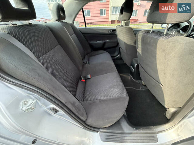 Серый Мицубиси Лансер, объемом двигателя 1.3 л и пробегом 160 тыс. км за 5555 $, фото 59 на Automoto.ua