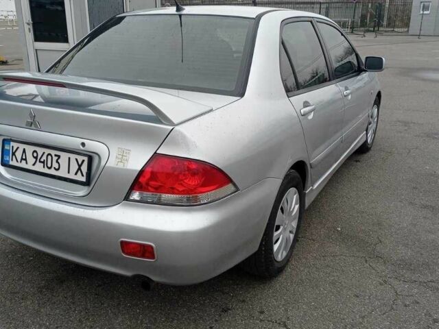 Сірий Міцубісі Lancer, об'ємом двигуна 1.6 л та пробігом 225 тис. км за 5500 $, фото 1 на Automoto.ua