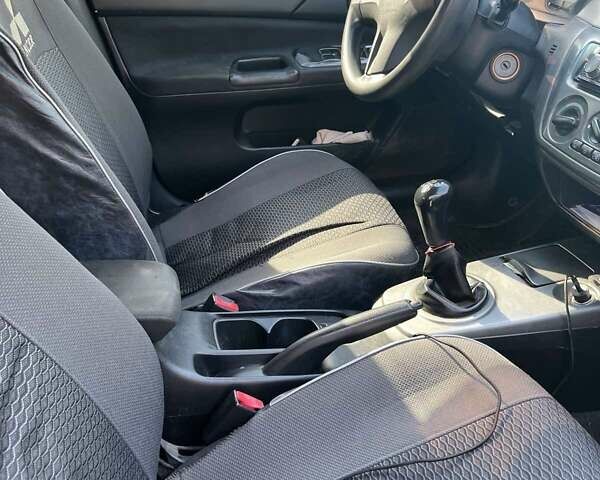 Сірий Міцубісі Lancer, об'ємом двигуна 1.6 л та пробігом 274 тис. км за 3700 $, фото 3 на Automoto.ua