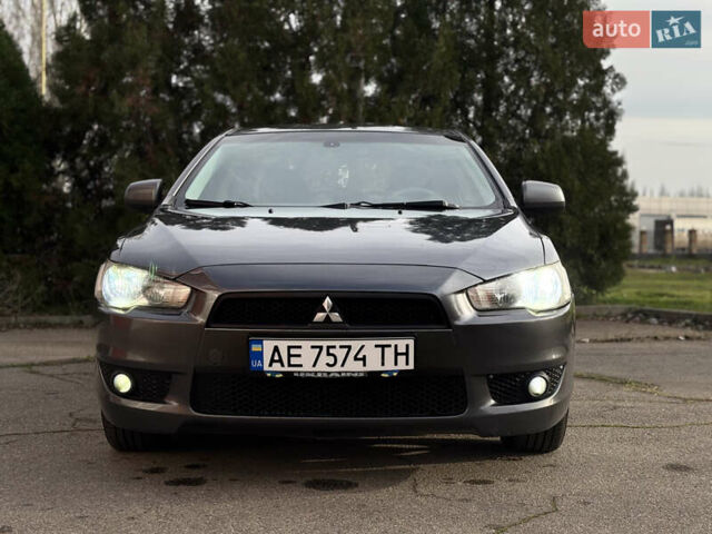 Сірий Міцубісі Lancer, об'ємом двигуна 2 л та пробігом 220 тис. км за 6800 $, фото 12 на Automoto.ua