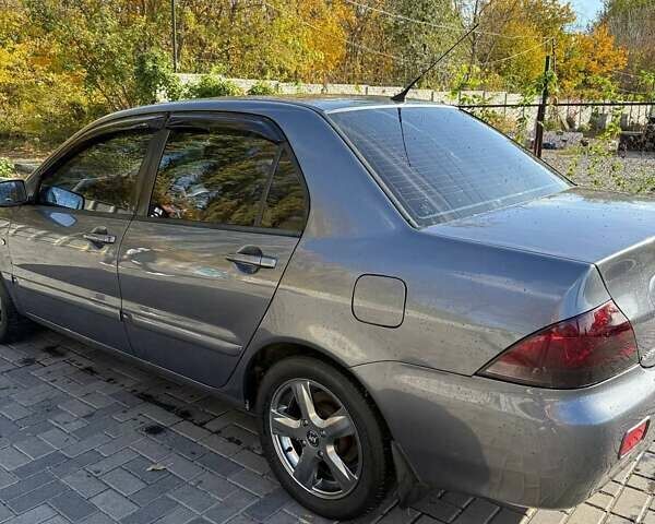 Мицубиси Лансер 2007 в Днепре (Днепропетровске) на Automoto.ua Серый Мицубиси Лансер, объемом двигателя 1.6 л и пробегом 220 тыс. км за 3500 $, фото 8 на Automoto.ua