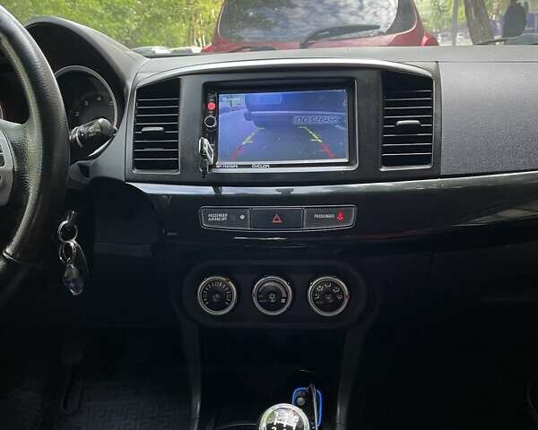 Сірий Міцубісі Lancer, об'ємом двигуна 2 л та пробігом 225 тис. км за 5500 $, фото 13 на Automoto.ua