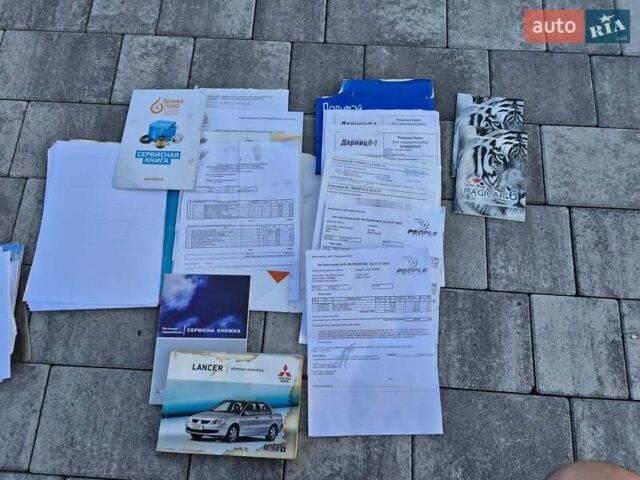 Серый Мицубиси Лансер, объемом двигателя 1.6 л и пробегом 184 тыс. км за 4500 $, фото 34 на Automoto.ua