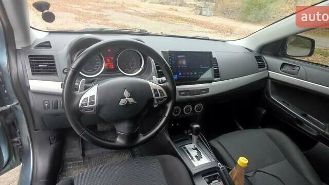 Сірий Міцубісі Lancer, об'ємом двигуна 2 л та пробігом 179 тис. км за 7700 $, фото 6 на Automoto.ua