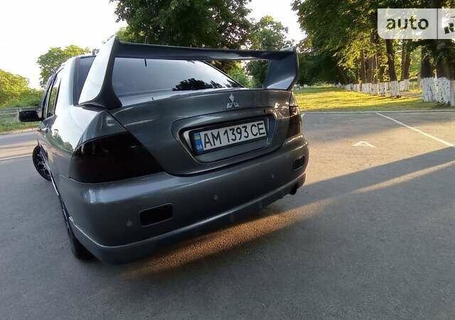 Сірий Міцубісі Lancer, об'ємом двигуна 1.6 л та пробігом 230 тис. км за 3950 $, фото 13 на Automoto.ua