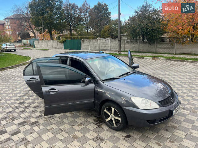 Міцубісі Lancer 2007 у Белой Церкве на Automoto.ua Сірий Міцубісі Lancer, об'ємом двигуна 1.58 л та пробігом 254 тис. км за 3200 $, фото 7 на Automoto.ua