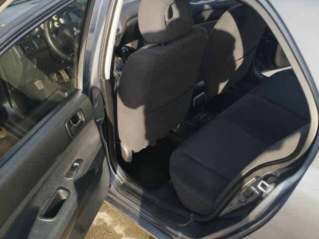 Сірий Міцубісі Lancer, об'ємом двигуна 1.6 л та пробігом 178 тис. км за 5464 $, фото 9 на Automoto.ua