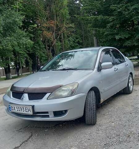 Сірий Міцубісі Lancer, об'ємом двигуна 1.6 л та пробігом 298 тис. км за 4100 $, фото 14 на Automoto.ua