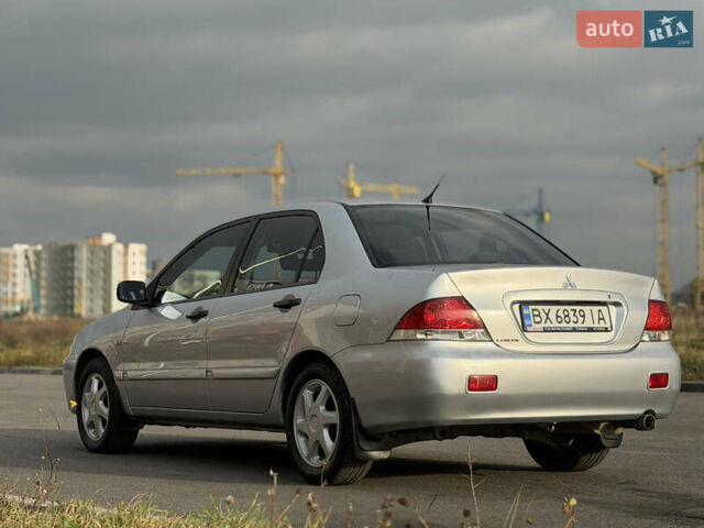 Сірий Міцубісі Lancer, об'ємом двигуна 1.3 л та пробігом 160 тис. км за 4999 $, фото 35 на Automoto.ua