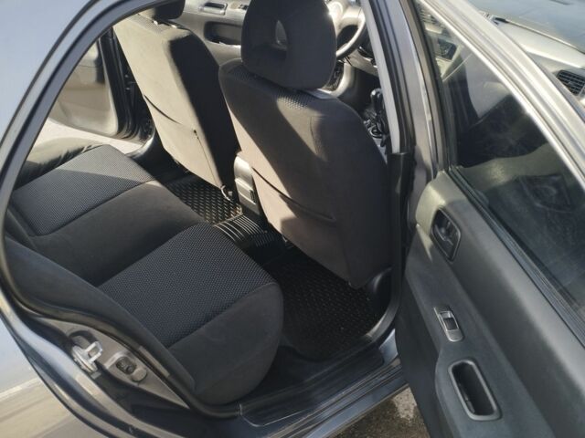 Сірий Міцубісі Lancer, об'ємом двигуна 1.6 л та пробігом 178 тис. км за 5464 $, фото 6 на Automoto.ua