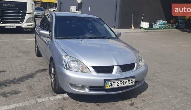 Серый Мицубиси Лансер, объемом двигателя 1.6 л и пробегом 420 тыс. км за 4900 $, фото 7 на Automoto.ua