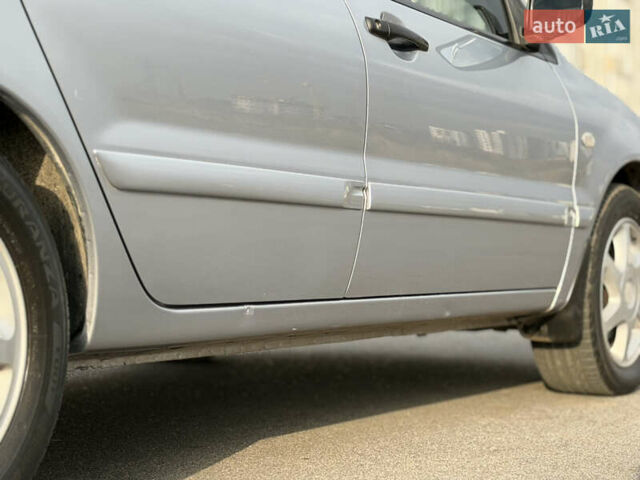 Серый Мицубиси Лансер, объемом двигателя 1.3 л и пробегом 160 тыс. км за 5555 $, фото 17 на Automoto.ua