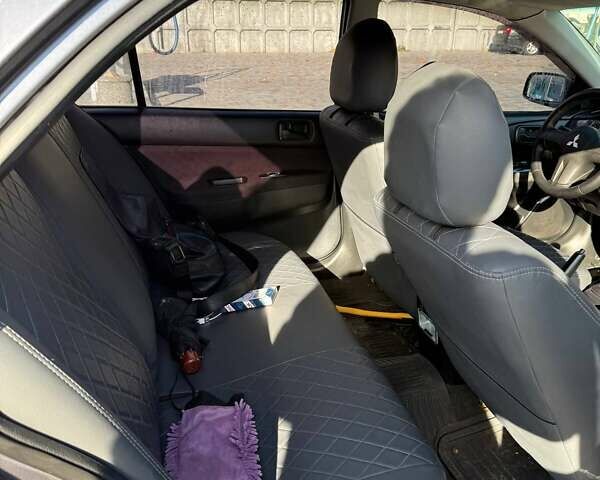 Мицубиси Лансер 2007 в Днепре (Днепропетровске) на Automoto.ua Серый Мицубиси Лансер, объемом двигателя 1.6 л и пробегом 220 тыс. км за 3500 $, фото 10 на Automoto.ua