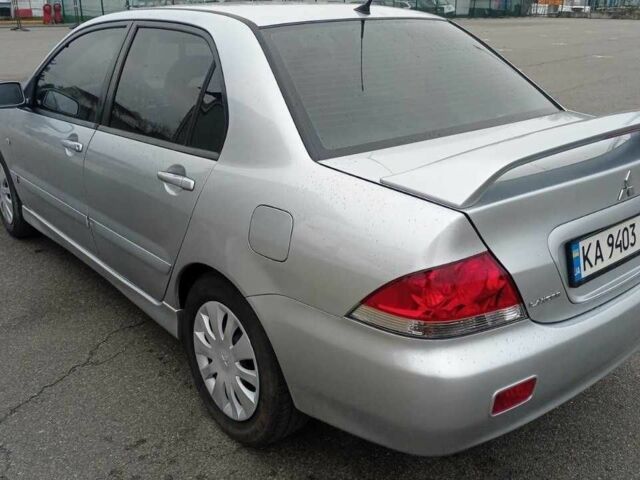 Сірий Міцубісі Lancer, об'ємом двигуна 1.6 л та пробігом 225 тис. км за 5500 $, фото 2 на Automoto.ua