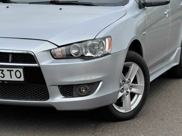 Серый Мицубиси Лансер, объемом двигателя 2 л и пробегом 207 тыс. км за 5800 $, фото 4 на Automoto.ua