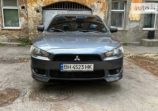 Сірий Міцубісі Lancer, об'ємом двигуна 2 л та пробігом 195 тис. км за 7600 $, фото 2 на Automoto.ua