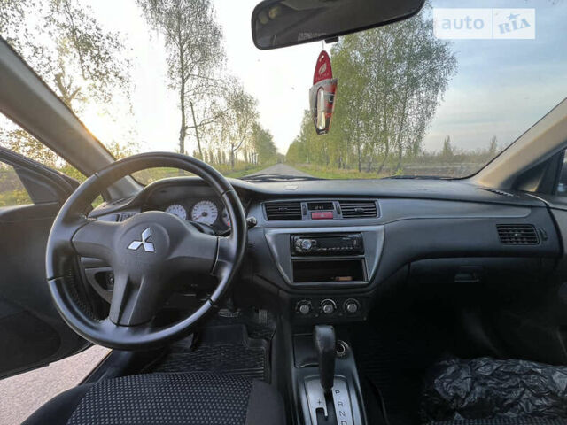 Сірий Міцубісі Lancer, об'ємом двигуна 1.6 л та пробігом 207 тис. км за 4800 $, фото 9 на Automoto.ua