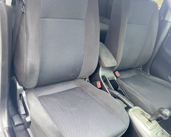 Серый Мицубиси Лансер, объемом двигателя 1.58 л и пробегом 240 тыс. км за 5500 $, фото 10 на Automoto.ua