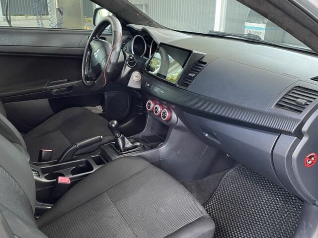 Серый Мицубиси Лансер, объемом двигателя 2 л и пробегом 244 тыс. км за 6500 $, фото 6 на Automoto.ua