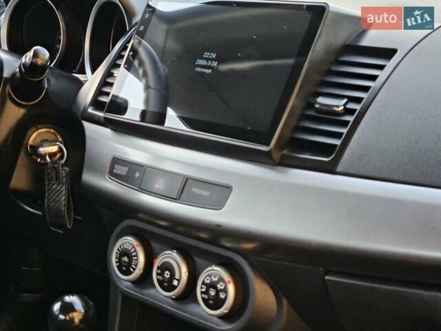 Серый Мицубиси Лансер, объемом двигателя 2 л и пробегом 282 тыс. км за 5450 $, фото 50 на Automoto.ua