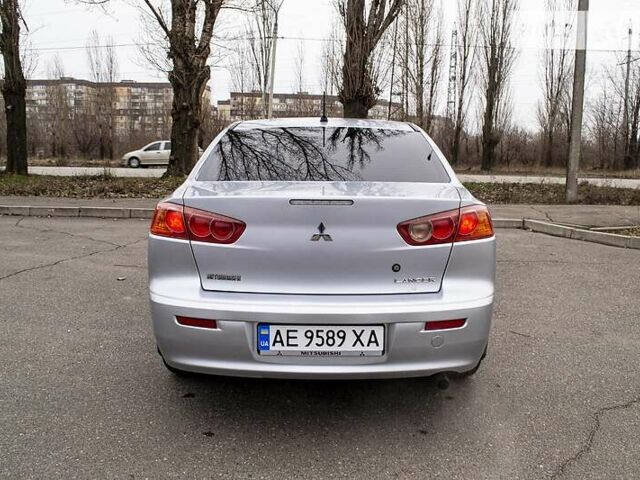 Сірий Міцубісі Lancer, об'ємом двигуна 2 л та пробігом 174 тис. км за 5900 $, фото 5 на Automoto.ua