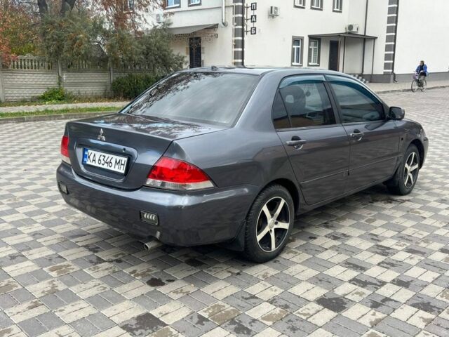 Міцубісі Lancer 2007 у Белой Церкве на Automoto.ua Сірий Міцубісі Lancer, об'ємом двигуна 1.6 л та пробігом 254 тис. км за 3200 $, фото 3 на Automoto.ua
