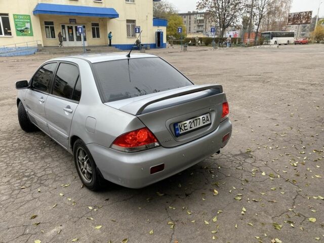 Серый Мицубиси Лансер, объемом двигателя 1.6 л и пробегом 380 тыс. км за 4000 $, фото 2 на Automoto.ua