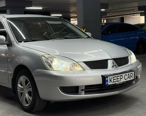 Серый Мицубиси Лансер, объемом двигателя 1.58 л и пробегом 271 тыс. км за 4200 $, фото 8 на Automoto.ua