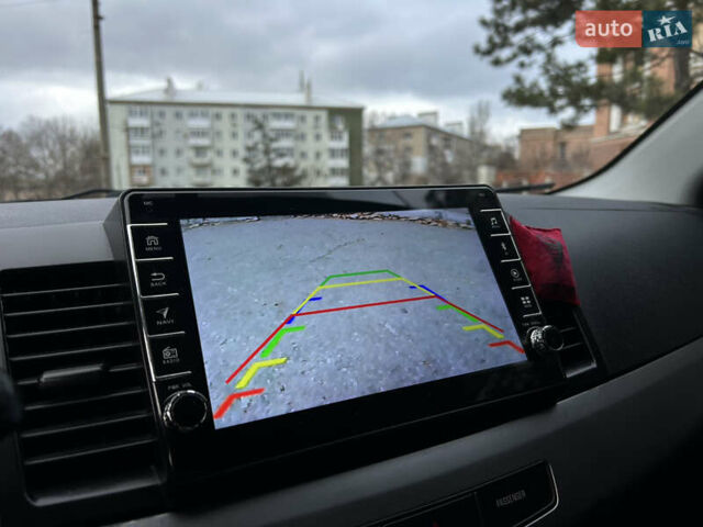 Серый Мицубиси Лансер, объемом двигателя 2 л и пробегом 199 тыс. км за 7499 $, фото 15 на Automoto.ua