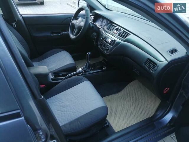 Сірий Міцубісі Lancer, об'ємом двигуна 1.6 л та пробігом 122 тис. км за 3500 $, фото 3 на Automoto.ua