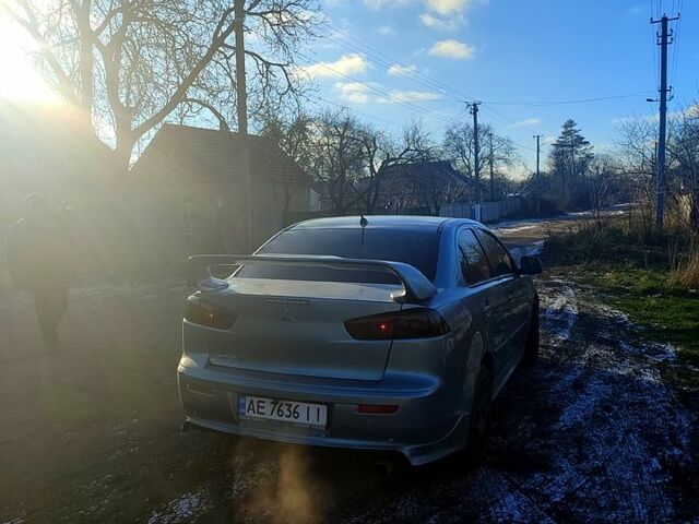 Серый Мицубиси Лансер, объемом двигателя 2 л и пробегом 225 тыс. км за 5500 $, фото 3 на Automoto.ua