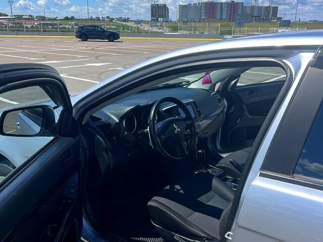 Серый Мицубиси Лансер, объемом двигателя 2 л и пробегом 233 тыс. км за 6700 $, фото 4 на Automoto.ua