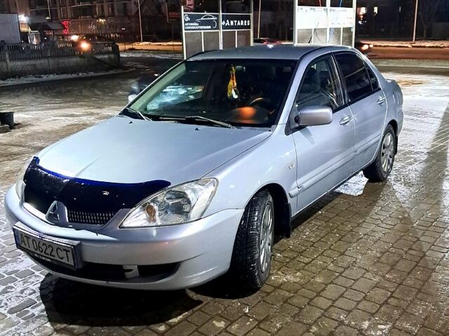 Сірий Міцубісі Lancer, об'ємом двигуна 1.6 л та пробігом 244 тис. км за 3900 $, фото 3 на Automoto.ua