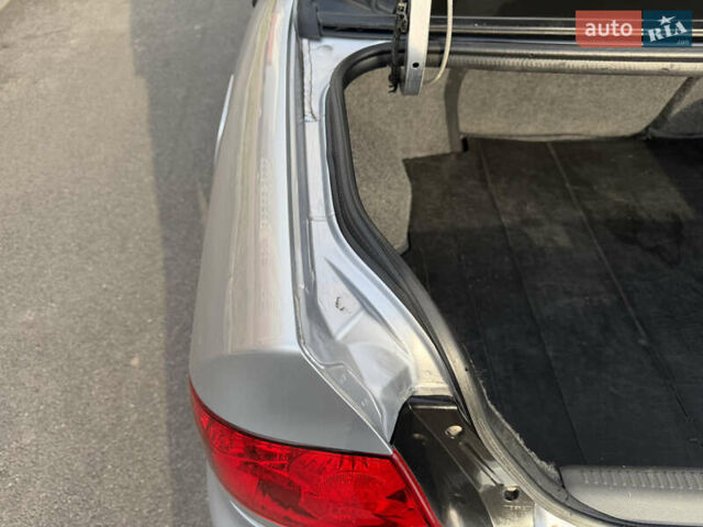 Серый Мицубиси Лансер, объемом двигателя 1.3 л и пробегом 160 тыс. км за 5555 $, фото 80 на Automoto.ua