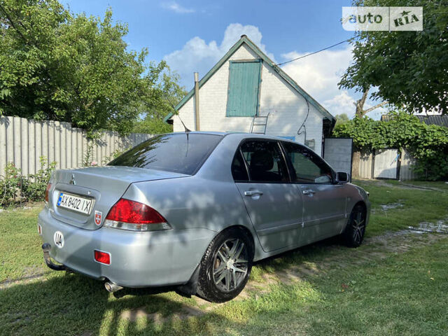 Сірий Міцубісі Lancer, об'ємом двигуна 1.6 л та пробігом 250 тис. км за 5500 $, фото 4 на Automoto.ua