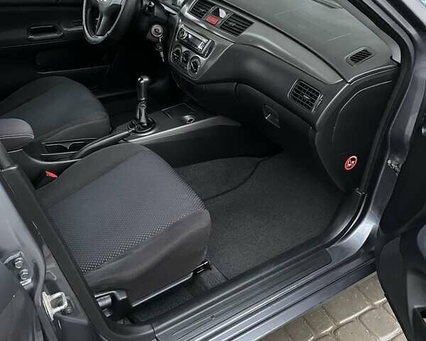 Сірий Міцубісі Lancer, об'ємом двигуна 1.6 л та пробігом 330 тис. км за 3500 $, фото 7 на Automoto.ua