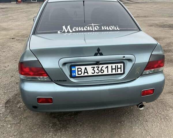Сірий Міцубісі Lancer, об'ємом двигуна 1.58 л та пробігом 341 тис. км за 4500 $, фото 6 на Automoto.ua