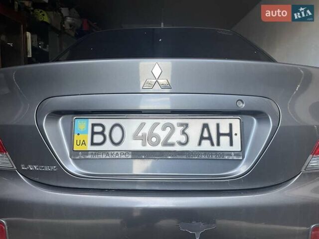 Сірий Міцубісі Lancer, об'ємом двигуна 1.6 л та пробігом 330 тис. км за 3500 $, фото 1 на Automoto.ua