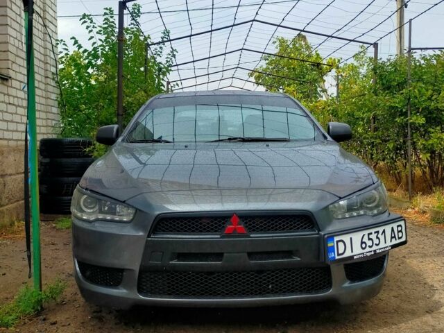 Серый Мицубиси Лансер, объемом двигателя 2 л и пробегом 351 тыс. км за 7000 $, фото 13 на Automoto.ua