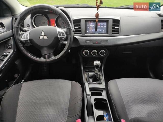 Сірий Міцубісі Lancer, об'ємом двигуна 2 л та пробігом 124 тис. км за 7499 $, фото 10 на Automoto.ua
