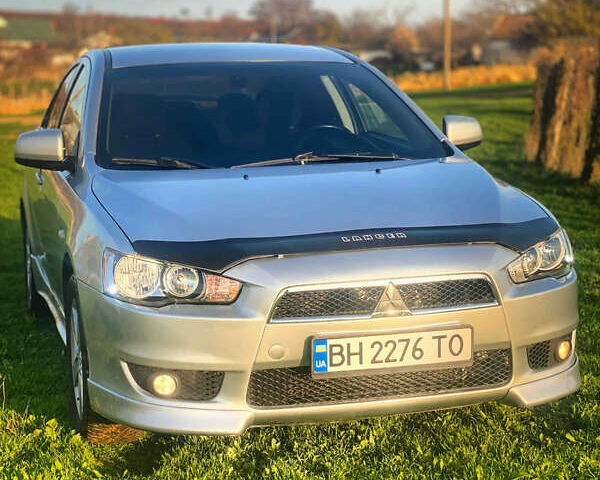 Серый Мицубиси Лансер, объемом двигателя 2 л и пробегом 226 тыс. км за 6200 $, фото 1 на Automoto.ua