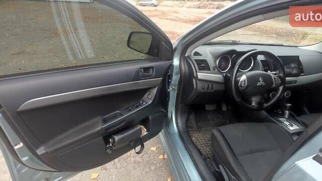 Сірий Міцубісі Lancer, об'ємом двигуна 2 л та пробігом 179 тис. км за 7700 $, фото 8 на Automoto.ua