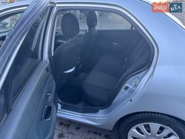 Серый Мицубиси Лансер, объемом двигателя 1.6 л и пробегом 256 тыс. км за 4500 $, фото 4 на Automoto.ua