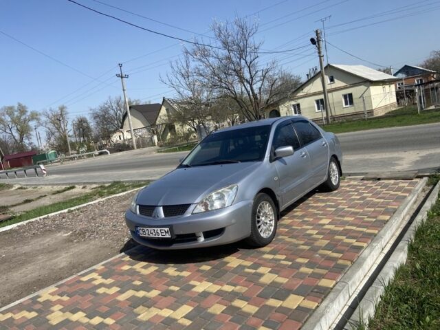 Сірий Міцубісі Lancer, об'ємом двигуна 0.16 л та пробігом 217 тис. км за 4200 $, фото 15 на Automoto.ua