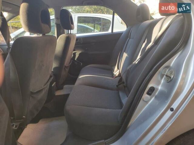 Серый Мицубиси Лансер, объемом двигателя 1.6 л и пробегом 223 тыс. км за 3300 $, фото 3 на Automoto.ua