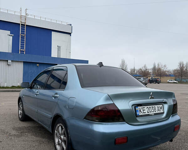 Серый Мицубиси Лансер, объемом двигателя 1.6 л и пробегом 238 тыс. км за 4400 $, фото 1 на Automoto.ua