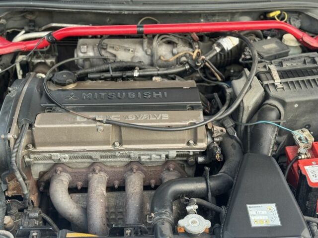 Серый Мицубиси Лансер, объемом двигателя 2 л и пробегом 185 тыс. км за 4600 $, фото 16 на Automoto.ua