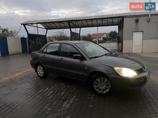 Сірий Міцубісі Lancer, об'ємом двигуна 1.6 л та пробігом 330 тис. км за 3500 $, фото 29 на Automoto.ua