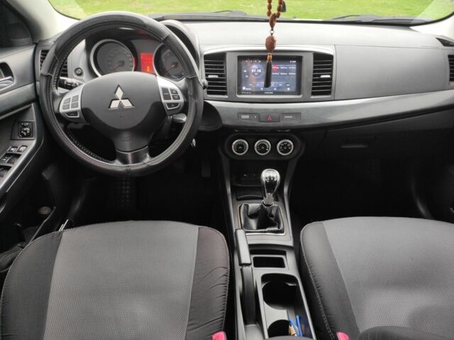 Серый Мицубиси Лансер, объемом двигателя 2 л и пробегом 124 тыс. км за 7499 $, фото 7 на Automoto.ua